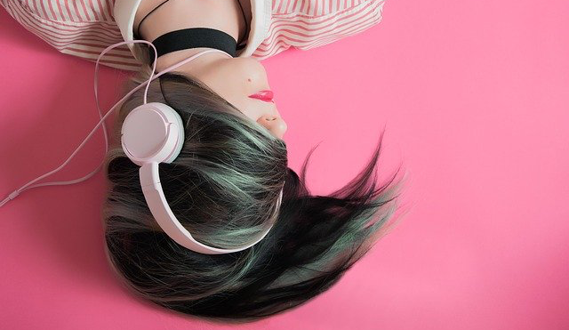 a woman listening to music