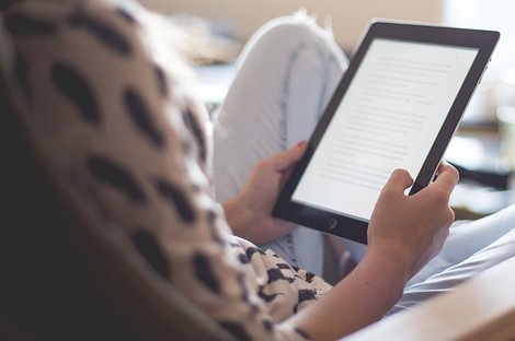 person with a kindle